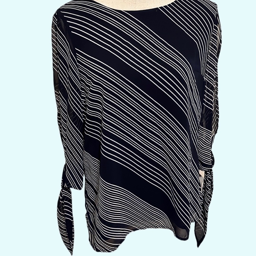 Pale Sky blouse, navy diagonal stripes. Size med
